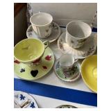 2 rows cups & saucers