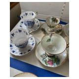2 rows cups & saucers