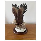 Homco eagle on wooden stand