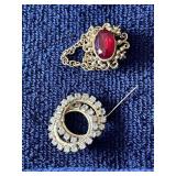 Row 5 - 8 brooches