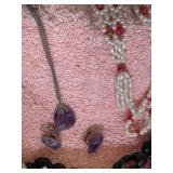 Vintage flat of lots of costume jewelry