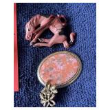 Row 10 - 8 brooches