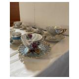 2 rows cups & saucers