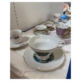 2 rows cups & saucers