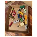 Flat of toy cars, trucks, farm equipment