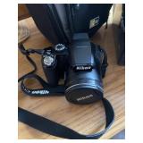 Nikon CoolPix camera & case w/attachments
