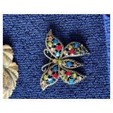 Row 4 - 7 brooches