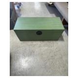 Green trunk, black handles