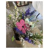Box of floral stems & wind spinners