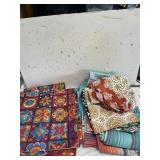 Stack of curtains & pillow cases