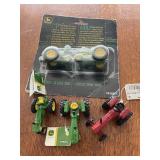 Groupig of small John Deere & Int tractors