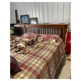 Mission style queen size bed with bedding