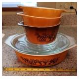 Four Covered Pyrex Dishes