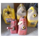 Five Plastic Gas Cans