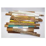 Large lot of vintage advetising rulers