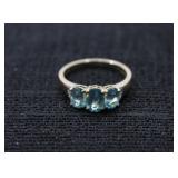 Light blue 14 K ring.