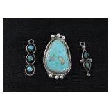 Three silver? and turquoise charms