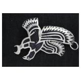 Large silver? eagle with black inlay