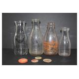 Lot of four vintage glass milk bottles and tabs