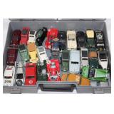 Large lot of toy cars in plastic case