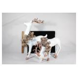 Two large Plastic? decorative deer