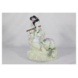 Asian Geisha Playing Flute Figurine