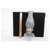 Antique glass oil lamp with globe