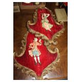 Two red velvet wall hangs