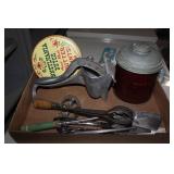 Vintage kitchen tools, nuts tin
