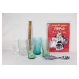 CocaCola book,ice cream scoop,glasses