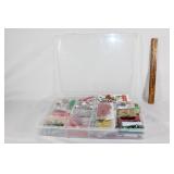 Large container of Christmas scrapbook decor