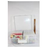 Large container of scrapbooking decorations