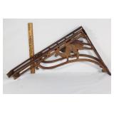 Two VTG cast iron camel adjustable braces