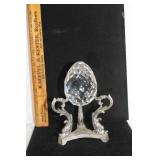 Crystal egg on metal fish base