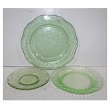 Three vintage green vaseline glass plates