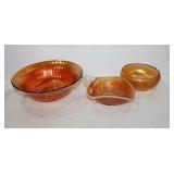 Three pieces of Carnival glass