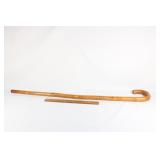Hand carved wooden cane with bent handle