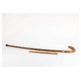Hand carved wooden walking can with metal detail