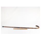 Hand carved wooden walking stick with bent handle