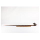 Short wooden cane, carved handle