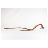 Hand carved wooden cane with carved face handle