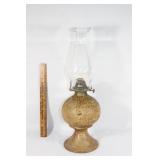 Clay signed oil lamp with glass globe