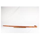 Hand carved wooden cane with carved detail