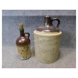 Two Vintage Whiskey Jugs
