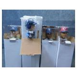 Four Twins Bobbleheads