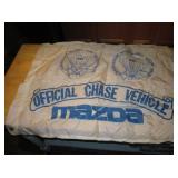 38" x 27" 1987 AIBF Mazda Chase Vehicle Banner