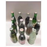 11 Vintage Soda Bottles - Most Capped w/ Product