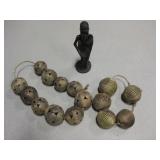 African Carved Wood Statue & Strung Brass Balls