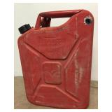 Bullet hole gas can on actual hole Red