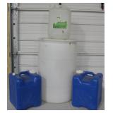 Plastic Barrel & 3 - 5 Gallon Water Jugs